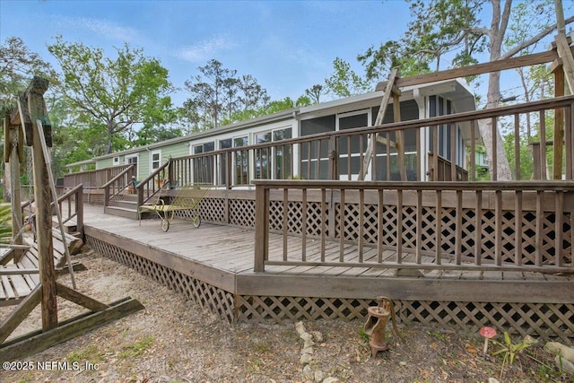 1418 Palm St NE, Steinhatchee, FL 32359 - back of house featuring a deck
