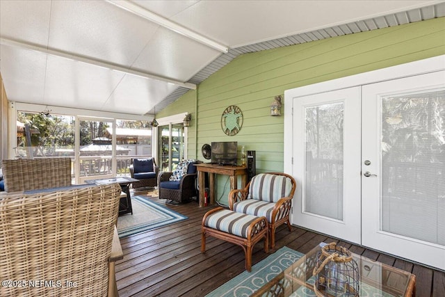 1418 Palm St NE, Steinhatchee, FL 32359 - sunroom / solarium with french doors, wooden walls, hardwood / wood-style flooring, and a deck