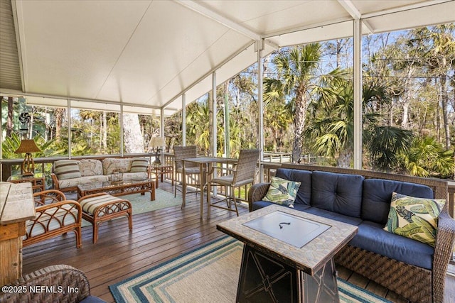 1418 Palm St NE, Steinhatchee, FL 32359 - sunroom featuring outdoor lounge area and lofted ceiling