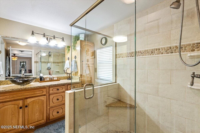 1418 Palm St NE, Steinhatchee, FL 32359 - full bath featuring a stall shower, vanity, and a ceiling fan