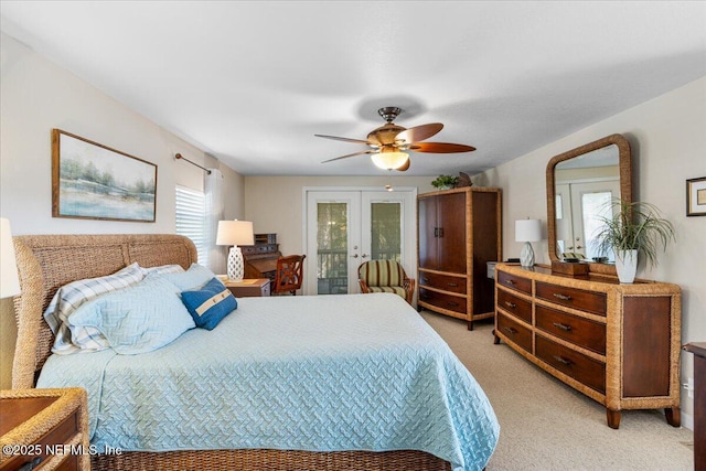 1418 Palm St NE, Steinhatchee, FL 32359 - bedroom featuring french doors, light colored carpet, access to exterior, and a ceiling fan