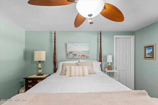 1418 Palm St NE, Steinhatchee, FL 32359 - bedroom featuring a ceiling fan