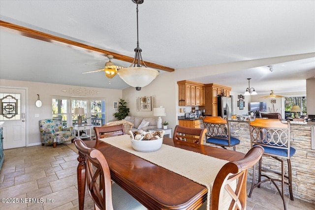1418 Palm St NE, Steinhatchee, FL 32359 - dining room featuring ceiling fan, stone tile floors, and baseboards