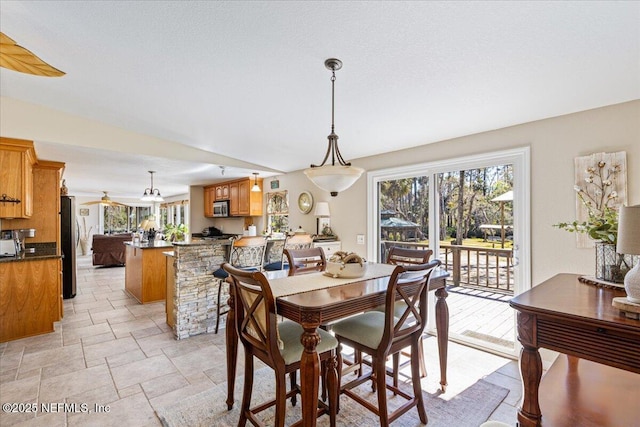 1418 Palm St NE, Steinhatchee, FL 32359 - dining room with light stone finish flooring