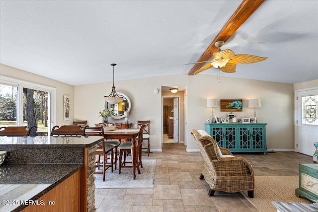 1418 Palm St NE, Steinhatchee, FL 32359 - living room with baseboards, light stone finish floors, and ceiling fan