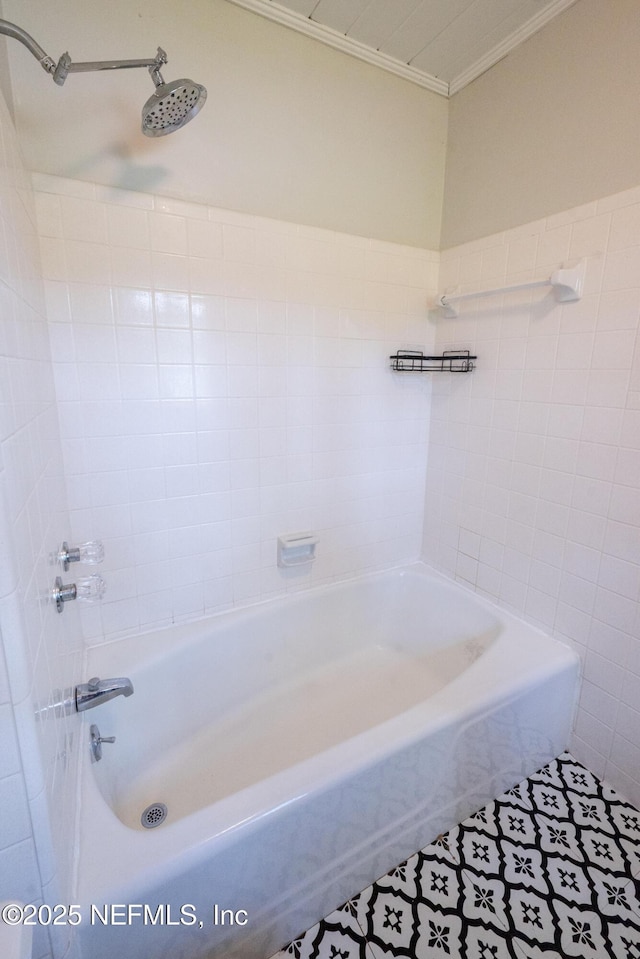 1525 E Call St, Starke, FL 32091 - full bath featuring tile walls, ornamental molding, shower / washtub combination, and tile patterned flooring