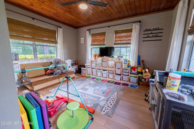 1525 E Call St, Starke, FL 32091 - playroom featuring plenty of natural light, ceiling fan, wooden ceiling, hardwood / wood-style floors, and crown molding