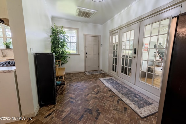 1525 E Call St, Starke, FL 32091 - entryway featuring crown molding and baseboards