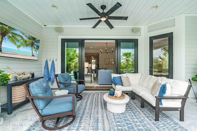 view of patio with ceiling fan and an outdoor hangout area