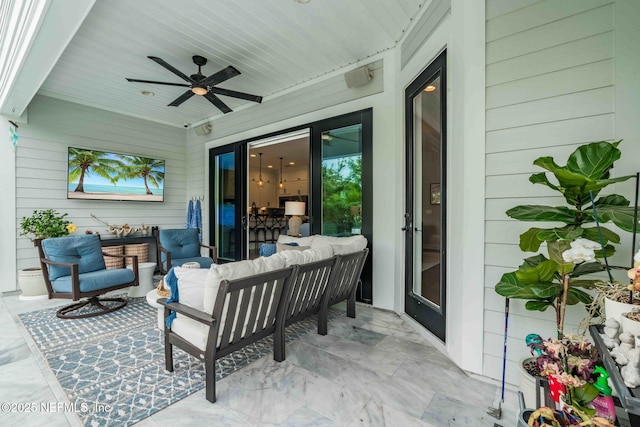 view of patio / terrace with ceiling fan and outdoor lounge area