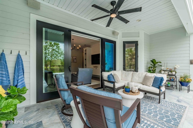 view of patio with outdoor lounge area and a ceiling fan