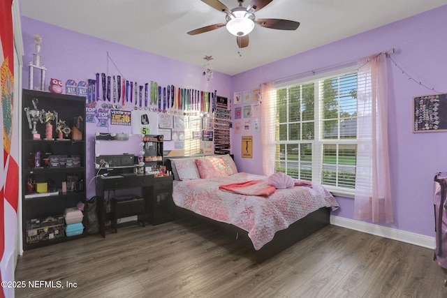 4508 Quail Hollow Rd, Orange Park, FL 32065 - bedroom with wood finished floors, baseboards, and a ceiling fan