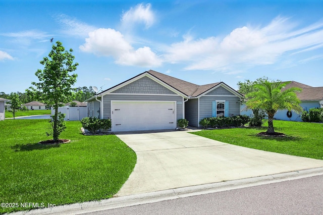 view of front of home with a garage and driveway