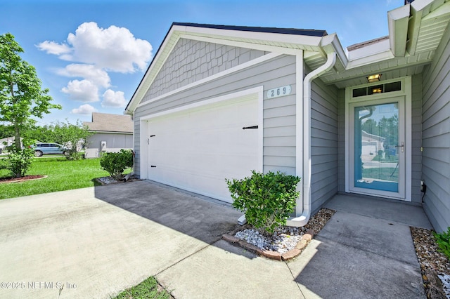 garage with driveway
