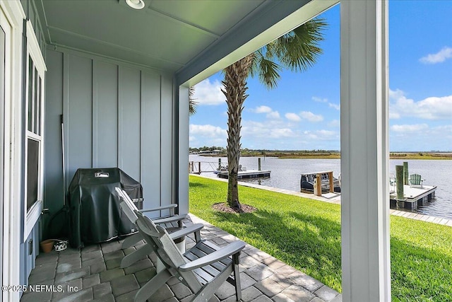 2540 Beach Blvd, Jacksonville Beach, FL 32250 - view of patio featuring a water view and a grill