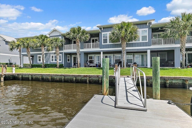 2540 Beach Blvd, Jacksonville Beach, FL 32250 - dock with a water view, a balcony, and a yard