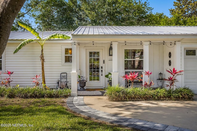 120 Swallow Rd, Saint Augustine, FL 32086 - property entrance featuring metal roof and a porch