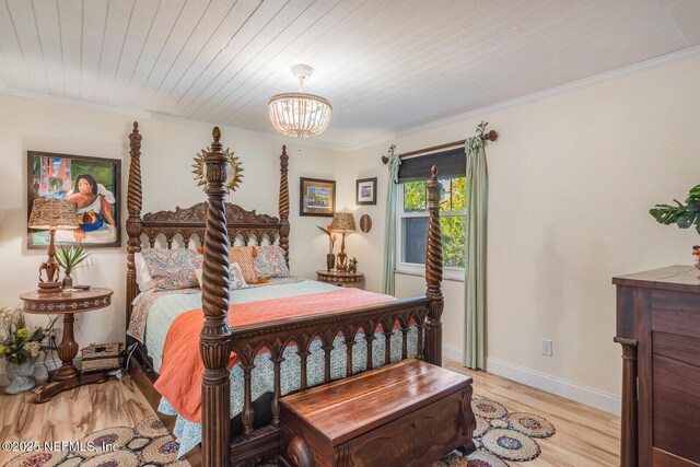 120 Swallow Rd, Saint Augustine, FL 32086 - bedroom with a chandelier, light wood-type flooring, ornamental molding, baseboards, and wood ceiling