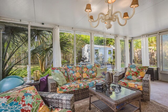 120 Swallow Rd, Saint Augustine, FL 32086 - sunroom featuring carpet flooring and a chandelier