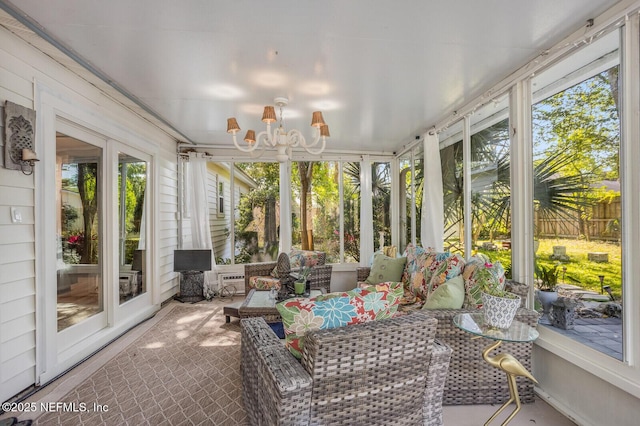 120 Swallow Rd, Saint Augustine, FL 32086 - sunroom with a chandelier