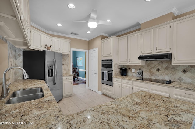 2072 Hawkcrest Dr E, Saint Johns, FL 32259 - kitchen featuring a sink, stainless steel appliances, under cabinet range hood, a ceiling fan, and light stone counters
