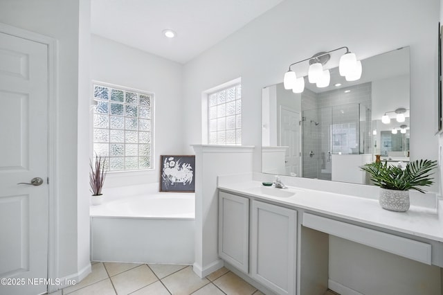 2012 Belle Grove Ter, Fleming Island, FL 32003 - full bath with healthy amount of natural light, a stall shower, vanity, a bath, and recessed lighting
