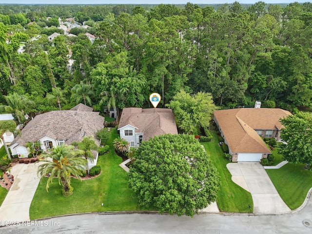 2012 Belle Grove Ter, Fleming Island, FL 32003 - aerial view of residential area featuring a heavily wooded area
