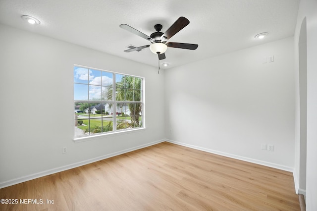 2012 Belle Grove Ter, Fleming Island, FL 32003 - empty room featuring light wood finished floors, ceiling fan, baseboards, and recessed lighting