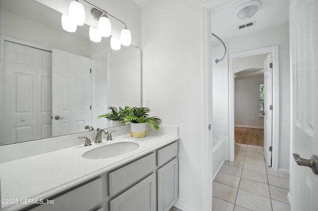 2012 Belle Grove Ter, Fleming Island, FL 32003 - full bathroom with tile patterned flooring, vanity, bathtub / shower combination, and baseboards