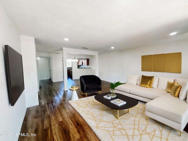 5201 Atlantic Blvd Unit 299, Jacksonville, FL 32207 - living room featuring wood finished floors, baseboards, recessed lighting, and a chandelier