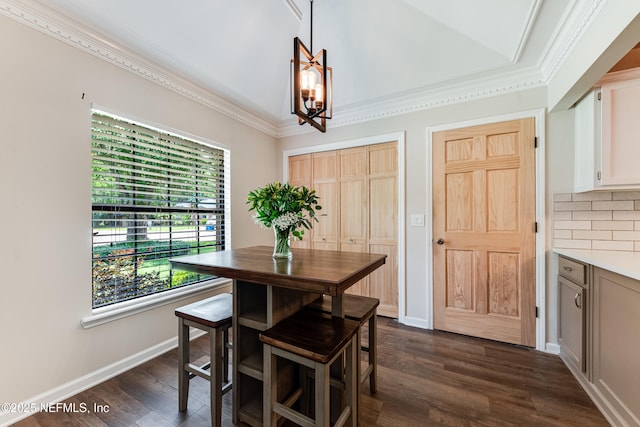 1835 Powder Springs Dr, Jacksonville, FL 32225 - dining space featuring a chandelier, dark wood-style floors, and crown molding