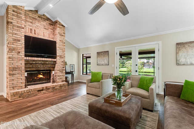 1835 Powder Springs Dr, Jacksonville, FL 32225 - living room featuring crown molding, wood finished floors, french doors, ceiling fan, and a brick fireplace