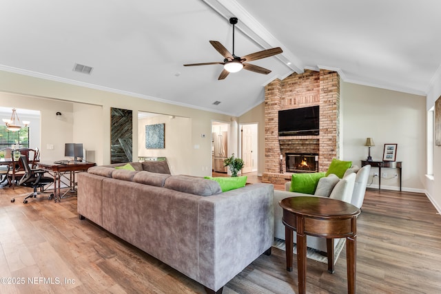 1835 Powder Springs Dr, Jacksonville, FL 32225 - living room featuring wood finished floors, a brick fireplace, ceiling fan, an office area, and ornamental molding