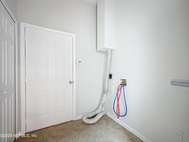 9421 Osprey Branch Trl Unit 2-3, Jacksonville, FL 32257 - washroom with washer hookup, baseboards, and light tile patterned floors