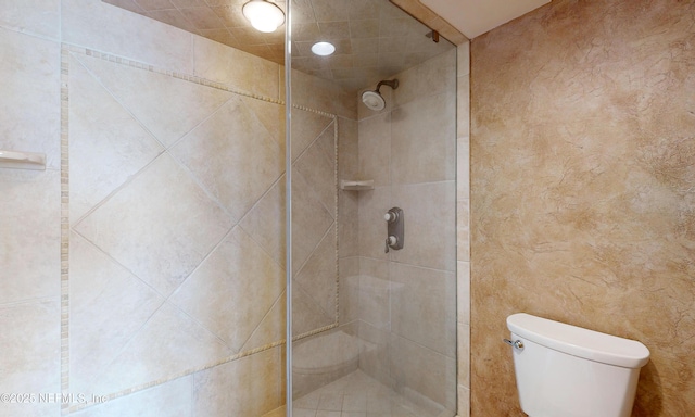 2100 Ocean Dr Unit Ph-2, Jacksonville Beach, FL 32250 - bathroom with a tile shower and toilet