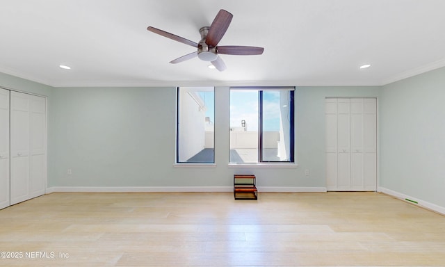 2100 Ocean Dr Unit Ph-2, Jacksonville Beach, FL 32250 - unfurnished bedroom featuring light wood finished floors, crown molding, recessed lighting, and ceiling fan
