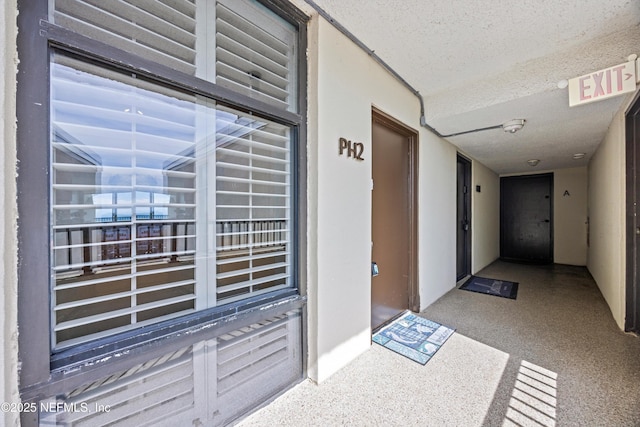 2100 Ocean Dr Unit Ph-2, Jacksonville Beach, FL 32250 - doorway to property with a balcony