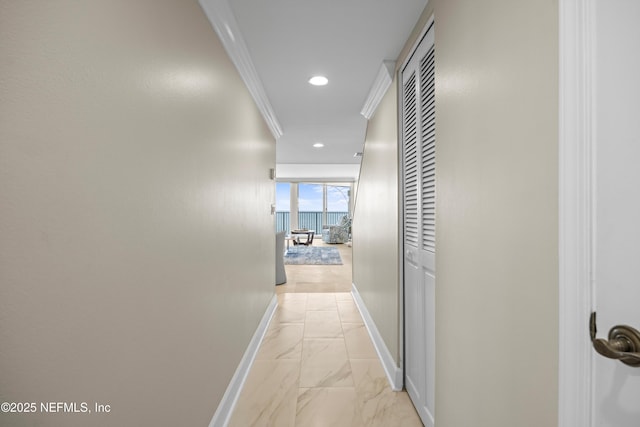 2100 Ocean Dr Unit Ph-2, Jacksonville Beach, FL 32250 - hallway featuring light marble finish flooring, recessed lighting, and crown molding