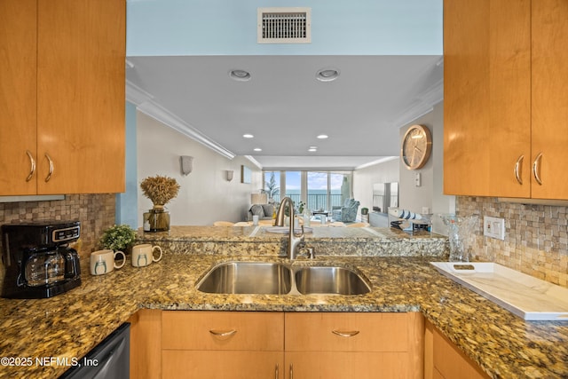 2100 Ocean Dr Unit Ph-2, Jacksonville Beach, FL 32250 - kitchen featuring ornamental molding, tasteful backsplash, dark stone counters, stainless steel dishwasher, and open floor plan