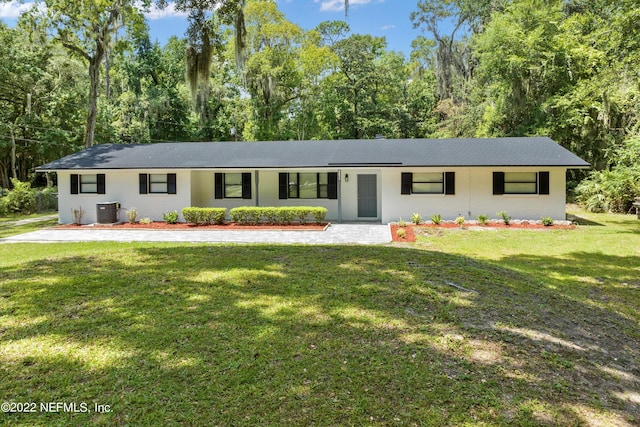 5092 Harvey Grant Rd, Fleming Island, FL 32003 - single story home featuring cooling unit and a front yard