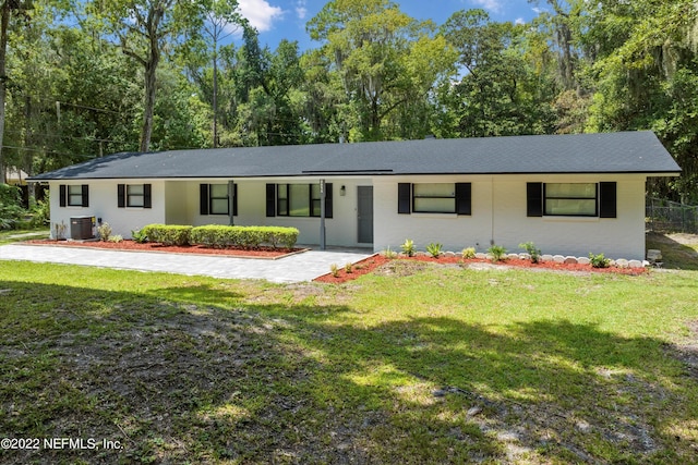 5092 Harvey Grant Rd, Fleming Island, FL 32003 - ranch-style house with cooling unit