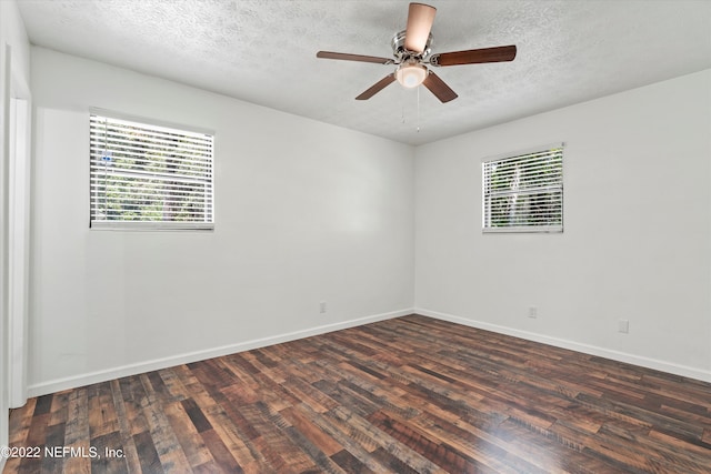 5092 Harvey Grant Rd, Fleming Island, FL 32003 - unfurnished room featuring healthy amount of natural light, wood finished floors, a textured ceiling, baseboards, and a ceiling fan
