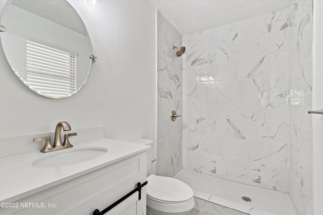 5092 Harvey Grant Rd, Fleming Island, FL 32003 - bathroom with a shower stall, toilet, vanity, and marble look tiles