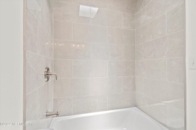 5092 Harvey Grant Rd, Fleming Island, FL 32003 - bathroom featuring shower / washtub combination