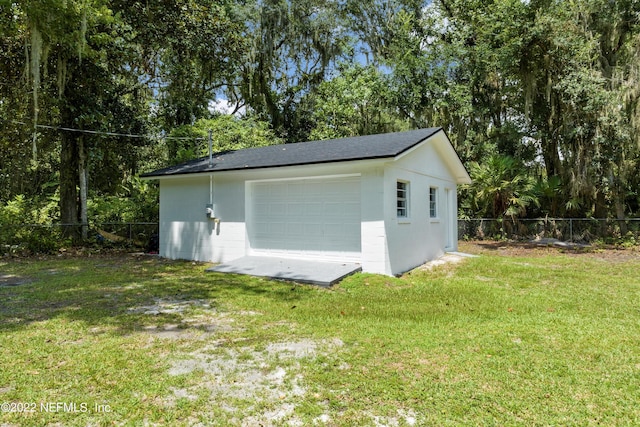 5092 Harvey Grant Rd, Fleming Island, FL 32003 - detached garage with view of wooded area