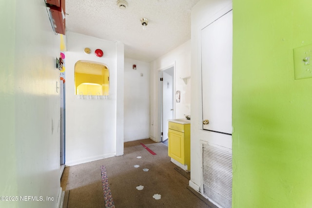 1403 Myrtle Ave N, Jacksonville, FL 32209 - hallway with a sink, baseboards, and carpet floors