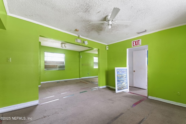 1403 Myrtle Ave N, Jacksonville, FL 32209 - carpeted empty room featuring ornamental molding, a textured ceiling, a ceiling fan, and baseboards