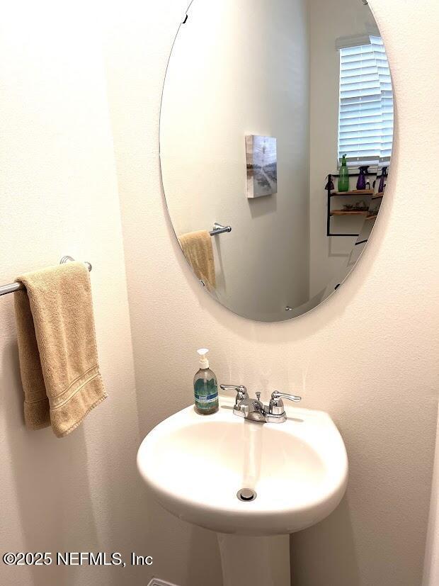 172 Reena Dr, Daytona Beach, FL 32117 - bathroom featuring a sink