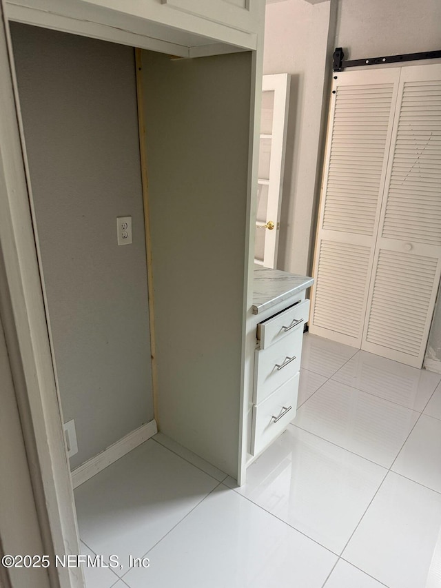 7205 Linda Dr, Jacksonville, FL 32208 - bathroom featuring tile patterned flooring and vanity