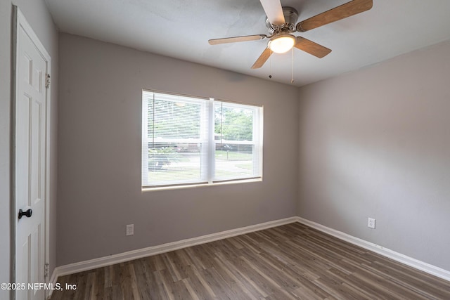 7205 Linda Dr, Jacksonville, FL 32208 - unfurnished room featuring wood finished floors, baseboards, and ceiling fan